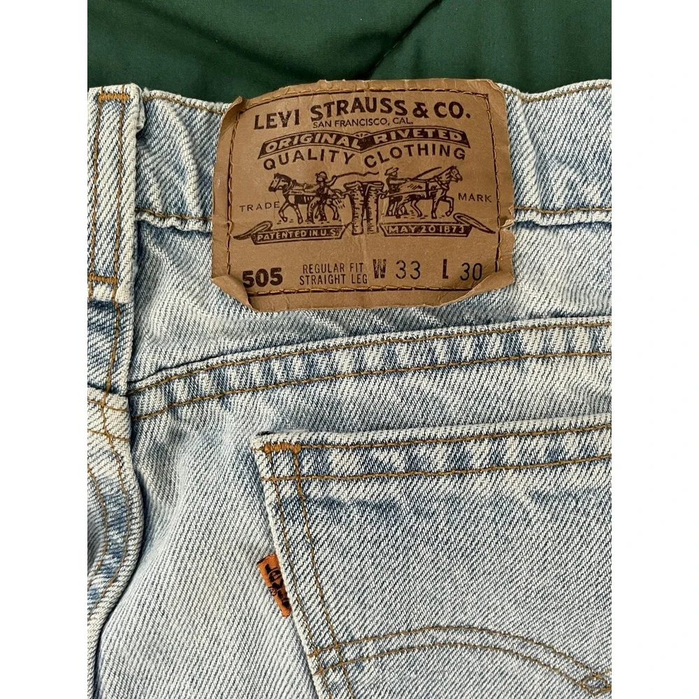 Vintage Levis 505 Regular Fit Straight Leg Jeans Light Wash Made in USA 33x30